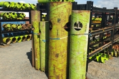 different sized bailers in the yard